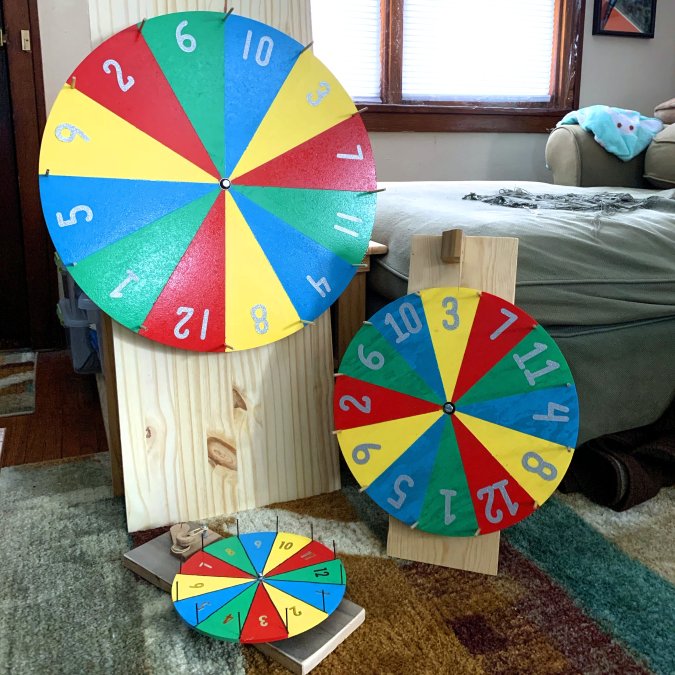 The Completely True Story of How I Ended Up Hanging a Spinning “Prize” Wheel Over My Living Room Window