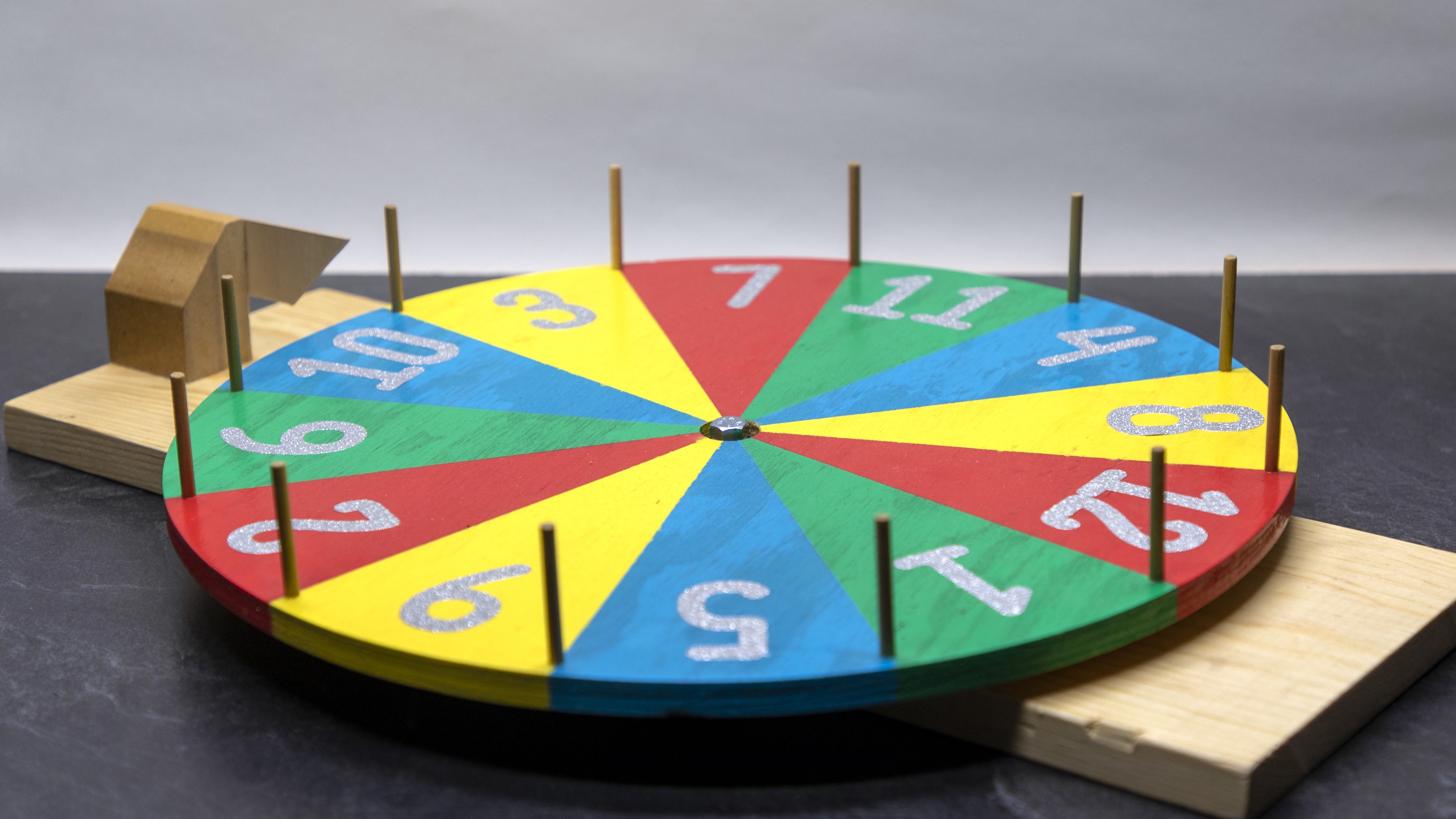 The Completely True Story of How I Ended Up Hanging a Spinning “Prize” Wheel Over My Living Room Window